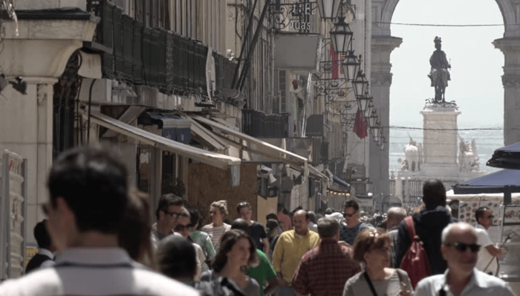 Tourists Visiting Lisbon City, Portugal. LISBON, PORTUGAL - 25 APRIL 2018; Crowd of people walking at Rua Augusta (Augusta street), located in one of the busiest quarters of Lisbon. R By Roddig Stock footage ID: 1010470586